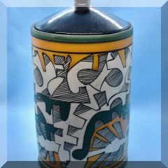 P12. Covered pottery jar in ivory, teal, gold and black.10”h - $18 